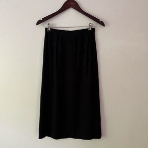 American Vintage | 100% silk Black midi skirt with a zipper and button closure